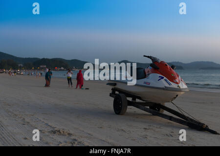 Jetski On Trailer On Cenang Beach After Sunset, Langkawi, Malaysia Stock Photo