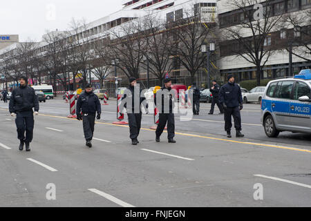 Berlin, Germany. 15th Mar, 2016. Police officers on Bismarckstrasse in Berlin, Germany, 15 March 2016. A driver died there, when an explosion occurred in the car while it was moving. PHOTO: PAUL ZINKEN/DPA/Alamy Live News Stock Photo