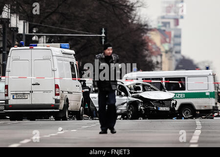 Berlin, Germany. 15th Mar, 2016. An investigator walks at the site of the car explosion in Berlin, Germany, on March 15, 2016. A car explosion caused by an explosive device in the German capital on Tuesday has killed the driver, German broadcaster ARD reported. Credit:  Zhang Fan/Xinhua/Alamy Live News Stock Photo