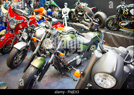 KIEV, UKRAINE - MARCH 13, 2016:  Row of retro and custom motorcycles on display at MotoBike 2016 Motor Show in Kiev, Ukraine. MotoBike is the largest annual motorcycle show in Ukraine. Stock Photo