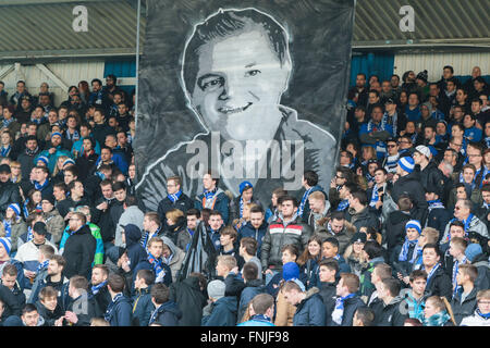 Darmstadt, Germany. 12th Mar, 2016. Darmstadt's fans holding up a photo ...