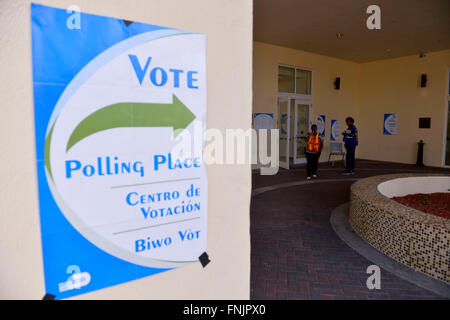 Miami, USA. 15th Mar, 2016. People guard at a polling station in Miami, Florida, the United States, March 15, 2016. New York billionaire developer Donald Trump on Tuesday took a stride towards locking up the 2016 Republican presidential nomination after a crucial victory in the winner-take-all Florida primary, according to local media projection. © Yin Bogu/Xinhua/Alamy Live News Stock Photo