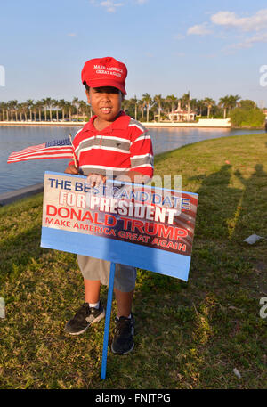 Miami, USA. 15th Mar, 2016. Manny Malaret, supporter of Donald Trump, stands in front of his Mar-A-Lago Club in Palm Beach, Florida, the United States, March 15, 2016. New York billionaire developer Donald Trump on Tuesday took a stride towards locking up the 2016 Republican presidential nomination after a crucial victory in the winner-take-all Florida primary, according to local media projection. © Yin Bogu/Xinhua/Alamy Live News Stock Photo
