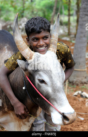 Portrait of a Young Jallikattu Bull Tamers.Jallikattu bull taming during Pongal festival.Madurai,Tamil Nadu,India, Manju Virattu Stock Photo