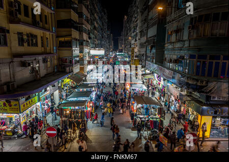 HONG KONG, CHINA - DEC 25, 2012: Crowded people walk through the market on December 25, 2012 in Mong Kok, Hong Kong. Mong Kok, H Stock Photo