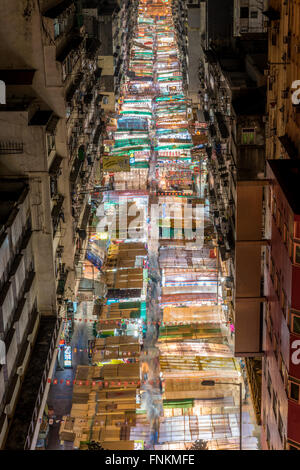 HONG KONG , CHINA - 15 MAR 2016: Temple street at night on March 15, 2016 in Hong Kong, China. Temple Street is the most famous  Stock Photo