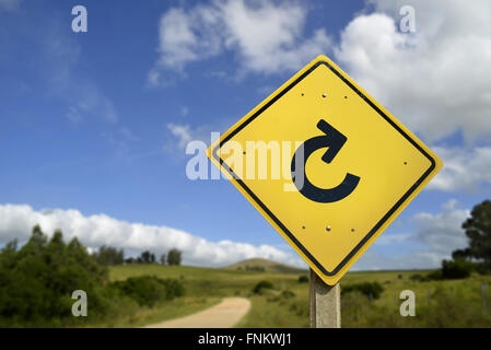 Fresh new start in a natural way, reload your life concept. Road sign with web refresh icon in countryside landscape, includes c Stock Photo