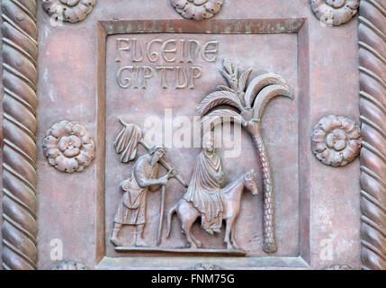 Flight to Egypt on the San Ranieri gate of the Cathedral St. Mary of the Assumption in Pisa, Italy Stock Photo