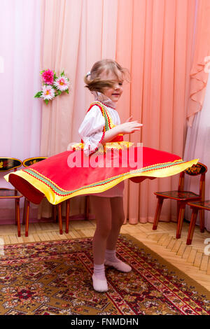 little girl in a red Russian national dress Stock Photo