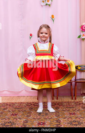 little girl in a red Russian national dress Stock Photo