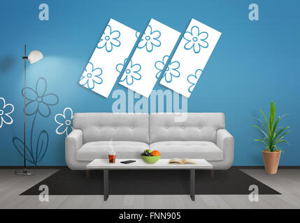 Flowers on art canvas in living room. Blue wall with flower wallpaper and gray wooden floor. Sofa, table, lamp and plant in room Stock Photo