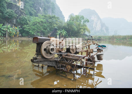 Rice Machine in Tam Coc - Vietnam Stock Photo