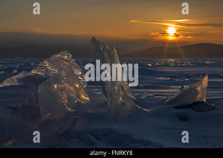 Sun Rising Ice Transparent pieces of ice and the rising sun Stock Photo - Alamy