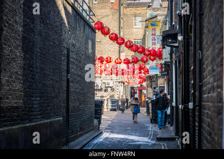 London, United Kingdom - March 13, 2016: London Chinatown is decorated with traditional red Chinese lanterns for Chinese NY Stock Photo