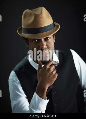 Elegant and calm young man looking at camera Stock Photo