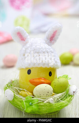 Easter decoration with little duck and eggs Stock Photo