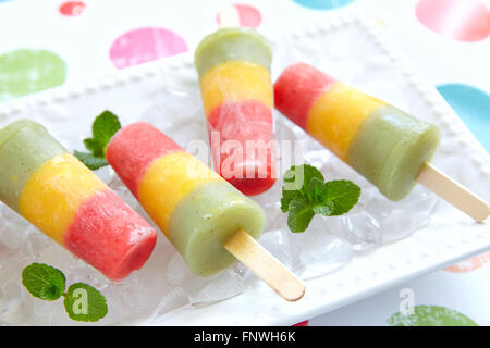 Homemade pureed fresh fruit popsicles Stock Photo