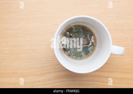 mouldy coffee tea mug Stock Photo