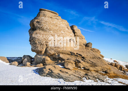 Carpathian Mountains, Romania. Romanian Sphinx, natural rock formation and geological phenomenon formed through erosion Bucegi. Stock Photo