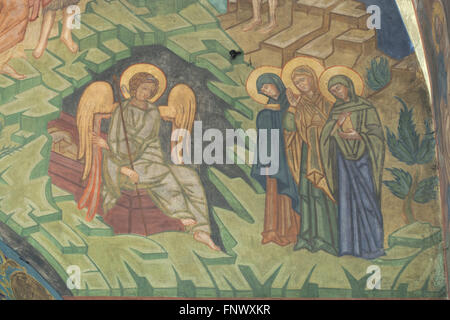 Holy Women at the Empty Tomb of Christ. Mural painting by Russian icon painters Rostislav Koryakin (1918-1999) and Andrei Ryazanov (1885-1950) in the Dormition Church at the Olsany Cemetery in Prague, Czech Republic. The Dormition Church designed by Russian architect Vladimir Brandt (1887-1944) was built in 1924-1925 by the Russian white emigration in Czechoslovakia. Mural paintings were realised in 1941-1945 by group of Russian icon painters after design by famous Russian book illustrator Ivan Bilibin (1876-1942) from 1926-1928. Stock Photo