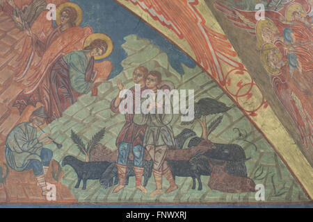 Adoration of the Shepherds. Mural painting by Russian icon painters Rostislav Koryakin (1918-1999) and Andrei Ryazanov (1885-1950) in the Dormition Church at the Olsany Cemetery in Prague, Czech Republic. The Dormition Church designed by Russian architect Vladimir Brandt (1887-1944) was built in 1924-1925 by the Russian white emigration in Czechoslovakia. Mural paintings were realised in 1941-1945 by group of Russian icon painters after design by famous Russian book illustrator Ivan Bilibin (1876-1942) from 1926-1928. Stock Photo