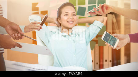 Composite image of hands holding devices Stock Photo