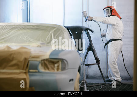 automotive repairs in the bodyshop. A car has its bodywork repaired