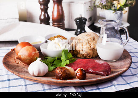 Assorted raw ingredients for Beef Stroganoff with mashed potatoes or celery - Stock image Stock Photo