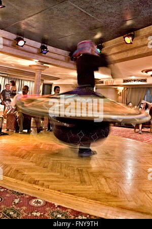 LUXOR, EGYPT - JULY 19: Tanura dancer performing for the entertainment of the tourists. On July 19, 2010 Luxor, Egypt Stock Photo