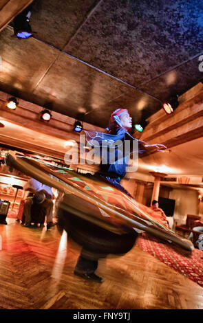 LUXOR, EGYPT - JULY 19: Tanura dancer performing for the entertainment of the tourists. On July 19, 2010 Luxor, Egypt Stock Photo