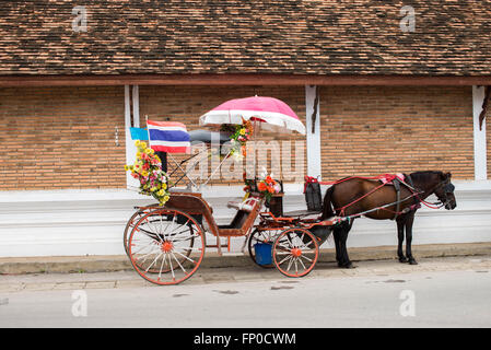 Horse carriages for tourist services in Lam-pang Thailand Stock Photo