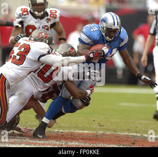 Tampa Bay Buccaneers' linebacker Shelton Quarles (53) tackles Seattle  Seahawks' running back Shaun Alexander as Seahawks' tight end Jerramy  Stevens (86) blocks Buccaneers' defensive end Greg Spires (94) at Raymond  James Stadium