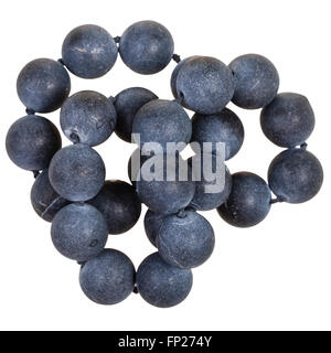 tangled necklace from black shungite gemstone balls on isolated white background Stock Photo