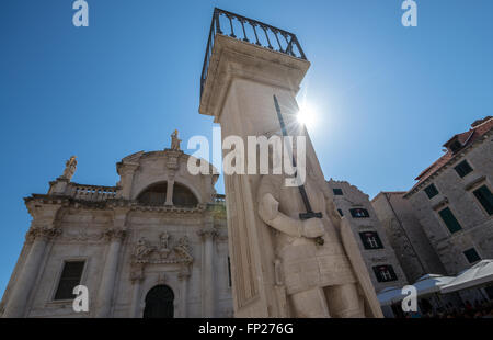 knight Orlando's Column in front of Saint Blaise's Baroque church at Luza Square on the Old Town of Dubrovnik city, Croatia Stock Photo