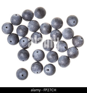 many beads from gray shungite gemstone isolated on white background Stock Photo