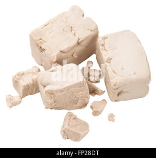 Portion of fresh Yeast isolated on white background (close-up shot) Stock Photo