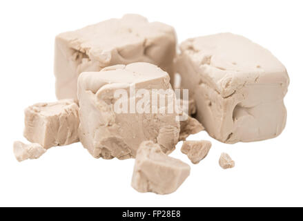 Portion of fresh Yeast isolated on white background (close-up shot) Stock Photo