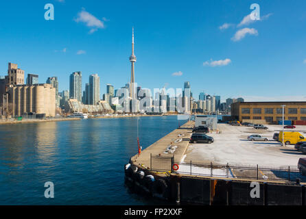 The Toronto skyline from the Billy Bishop Toronto City Airport overlooking the parking lot. Toronto, Ontario, Canada. Stock Photo