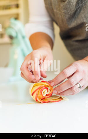 woman baking apple pies roses pastry Stock Photo