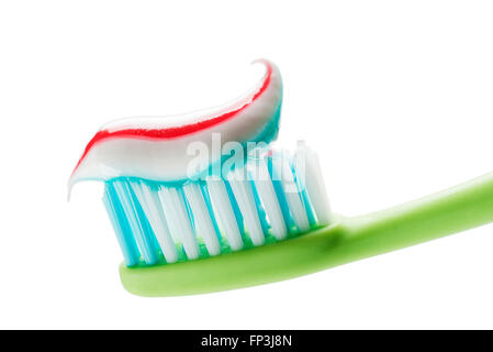 Toothbrush and toothpaste isolated on white close up. Stock Photo