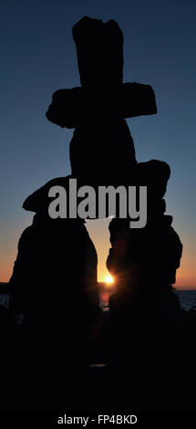 The Inukshuk, symbol of the First Nations at English Bay, Vancouver Stock Photo