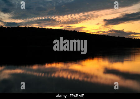 Sunset and reflections on a lake in Algonquin National Park. Stock Photo
