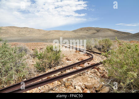 Old rusted train tracks at Eureka Mine in Death Valley National Park, USA Stock Photo