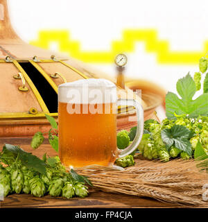 glass of beer with hops and barley in the brewery Stock Photo