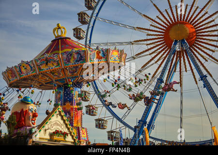Europe, Germany, Bavaria, Munich, Oktoberfest, chairoplane and Ferris wheel Stock Photo
