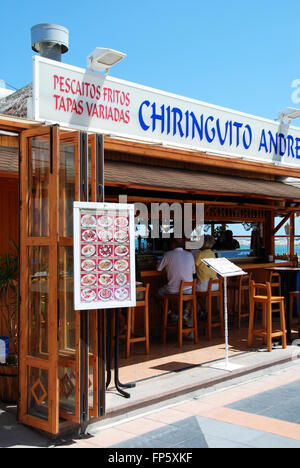 Beach bar entrance and menu board on the edge of the beach, Benalmadena, Costa del Sol, Malaga Province, Andalusia, Spain. Stock Photo