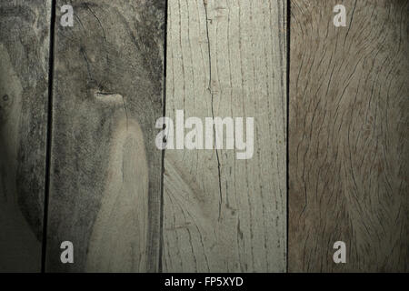Rustic weathered barn wood background with knots and nail holes. Stock Photo