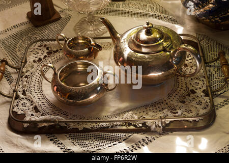 Victorian silver tea set on a decorative tray Stock Photo