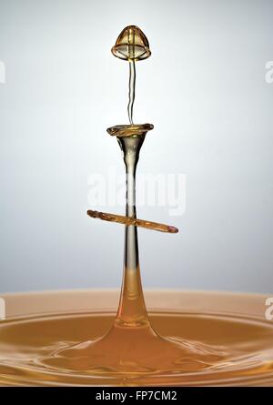 A four drop high speed flash photograph. Stock Photo