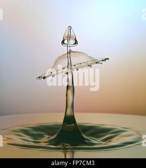 A high speed flash water drop collision. Stock Photo